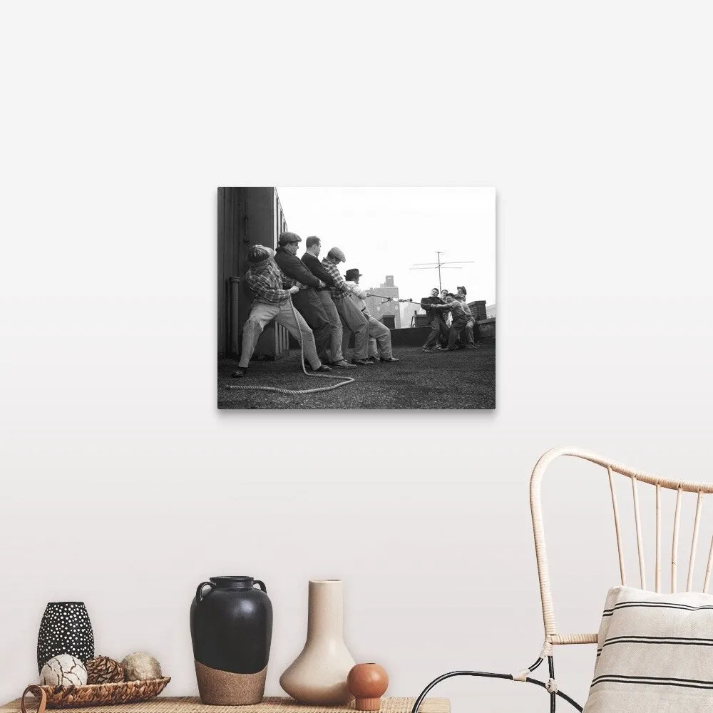 "1950's Two Groups Of Five Men Each Pulling On Tug-Of-War Rope On Building Roo" Canvas Wall Art