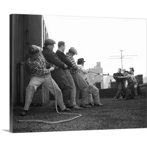 "1950's Two Groups Of Five Men Each Pulling On Tug-Of-War Rope On Building Roo" Canvas Wall Art